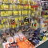 Wall display of gun cleaning supplies, firearm parts, brushes, and maintenance tools at Pickett Weaponry in Newberry, FL.
